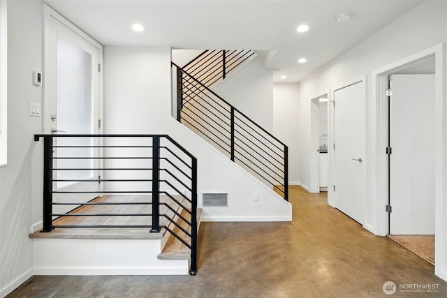 9732 Woodlawn Ave N Unit A, Seattle, WA 98103 - staircase with concrete flooring and recessed lighting