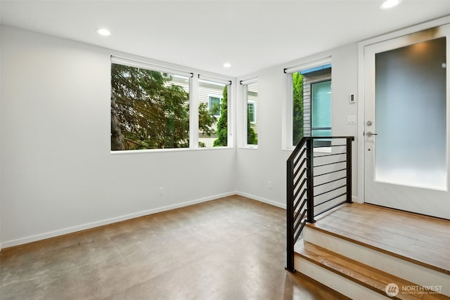 9732 Woodlawn Ave N Unit A, Seattle, WA 98103 - staircase featuring recessed lighting, plenty of natural light, and finished concrete flooring