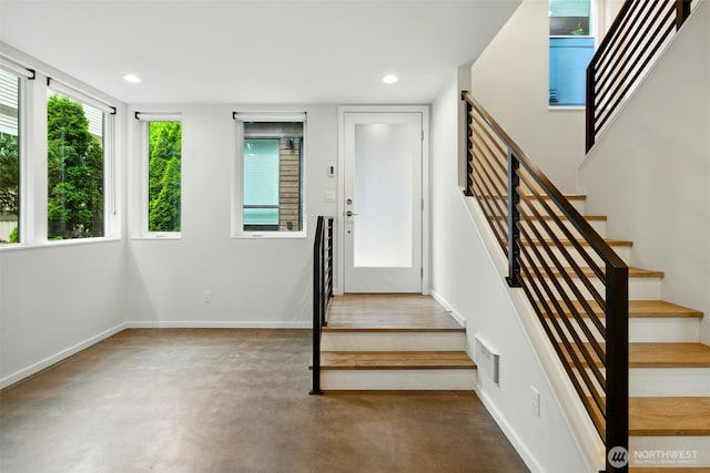 9732 Woodlawn Ave N Unit A, Seattle, WA 98103 - stairway featuring concrete flooring and recessed lighting