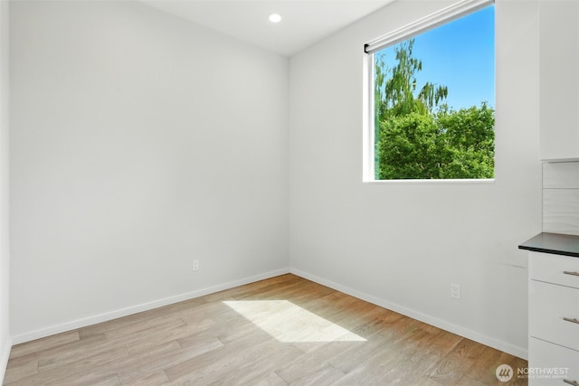 9732 Woodlawn Ave N Unit A, Seattle, WA 98103 - spare room featuring light wood finished floors and recessed lighting