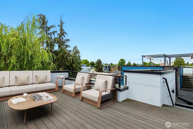 9732 Woodlawn Ave N Unit A, Seattle, WA 98103 - wooden deck with outdoor lounge area