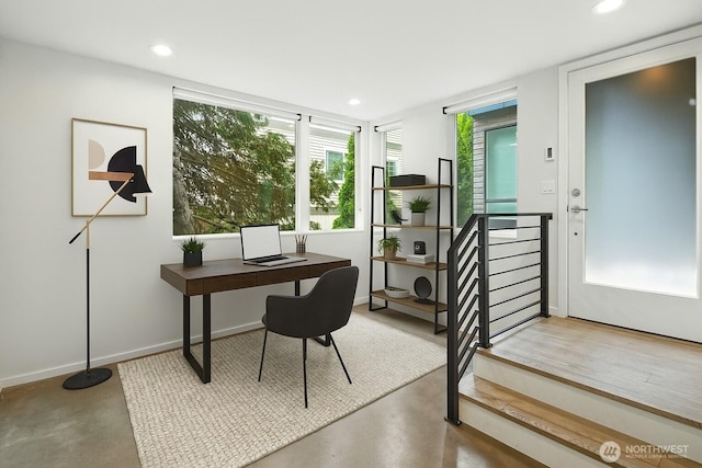 9732 Woodlawn Ave N Unit A, Seattle, WA 98103 - home office with finished concrete flooring and recessed lighting
