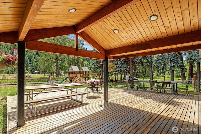 330 Swauk Creek Ln, Cle Elum, WA 98922 - deck with a playground, view of wooded area, and outdoor dining area