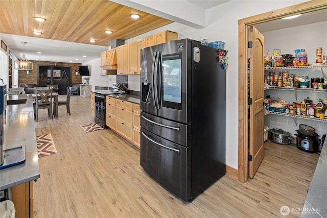 330 Swauk Creek Ln, Cle Elum, WA 98922 - kitchen featuring refrigerator with ice dispenser, black range with electric stovetop, light brown cabinetry, light wood-type flooring, and recessed lighting
