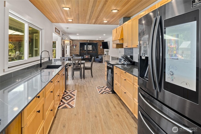 330 Swauk Creek Ln, Cle Elum, WA 98922 - kitchen featuring fridge with ice dispenser, electric range, light wood-style floors, open floor plan, and recessed lighting