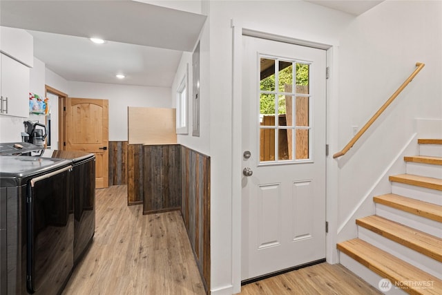 330 Swauk Creek Ln, Cle Elum, WA 98922 - washroom featuring light wood-type flooring, washer and clothes dryer, and recessed lighting