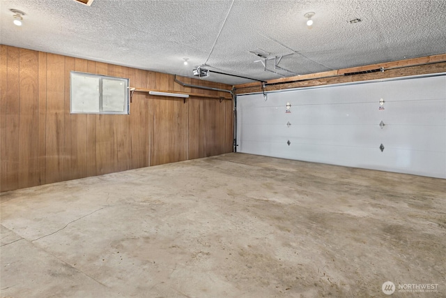 330 Swauk Creek Ln, Cle Elum, WA 98922 - garage with a garage door opener and wood walls