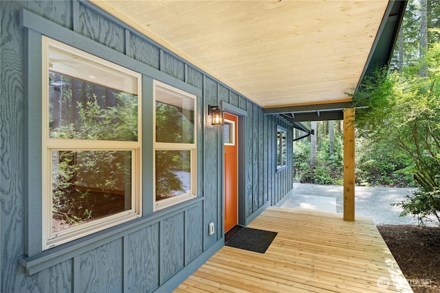 10405 Tahoma Dr, Anderson Island, WA 98303 - view of exterior entry featuring board and batten siding