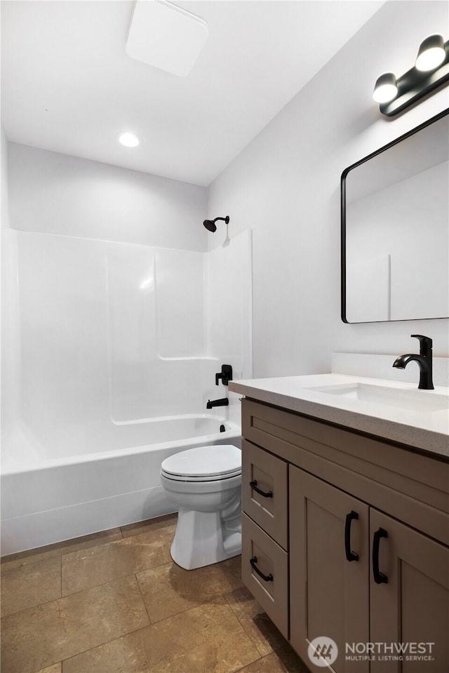 10405 Tahoma Dr, Anderson Island, WA 98303 - full bath featuring vanity, shower / bathtub combination, stone finish flooring, and recessed lighting