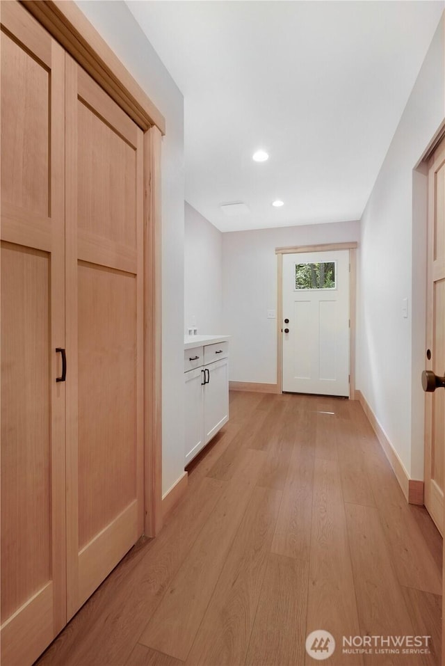 10405 Tahoma Dr, Anderson Island, WA 98303 - hallway with light wood-style flooring and recessed lighting