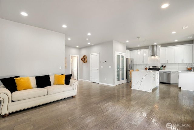 8438 Tacoma Ave S, Tacoma, WA 98444 - living area featuring wood finished floors and recessed lighting