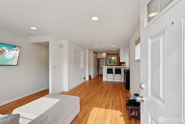 8450 25th Ave SW Unit B, Seattle, WA 98106 - living area featuring light wood-style floors and recessed lighting