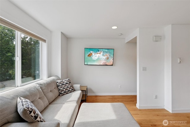 8450 25th Ave SW Unit B, Seattle, WA 98106 - living room featuring light wood finished floors and recessed lighting