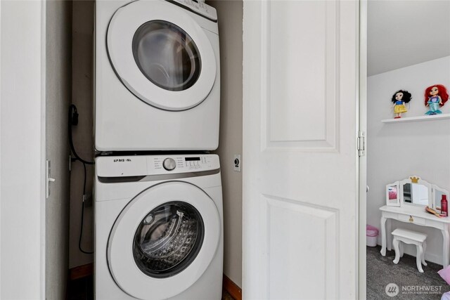 8450 25th Ave SW Unit B, Seattle, WA 98106 - laundry room with estacked washer and dryer and carpet flooring