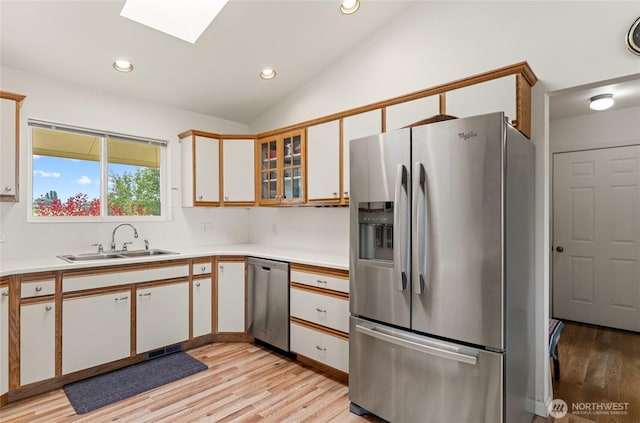19627 Rd A NE, Soap Lake, WA 98851 - kitchen featuring appliances with stainless steel finishes, lofted ceiling, light wood finished floors, light countertops, and recessed lighting