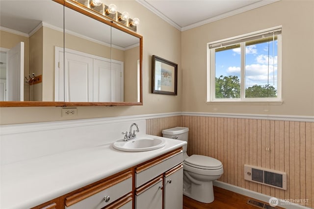 19627 Rd A NE, Soap Lake, WA 98851 - bathroom featuring vanity, a wainscoted wall, wood finished floors, and ornamental molding