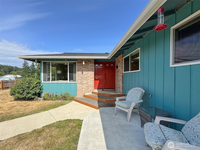 1521 W 13th St, Port Angeles, WA 98363 - view of exterior entry with board and batten siding