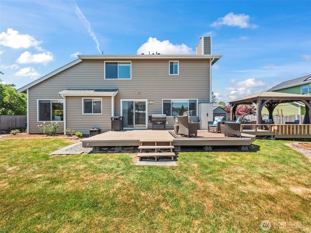 535 Blanchat Ct, Enumclaw, WA 98022 - back of property featuring a gazebo, a chimney, an outdoor hangout area, and a deck