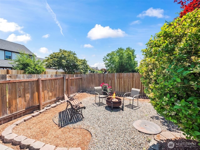 535 Blanchat Ct, Enumclaw, WA 98022 - view of yard with an outdoor fire pit and a patio
