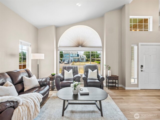 535 Blanchat Ct, Enumclaw, WA 98022 - living room featuring wood finished floors and a high ceiling