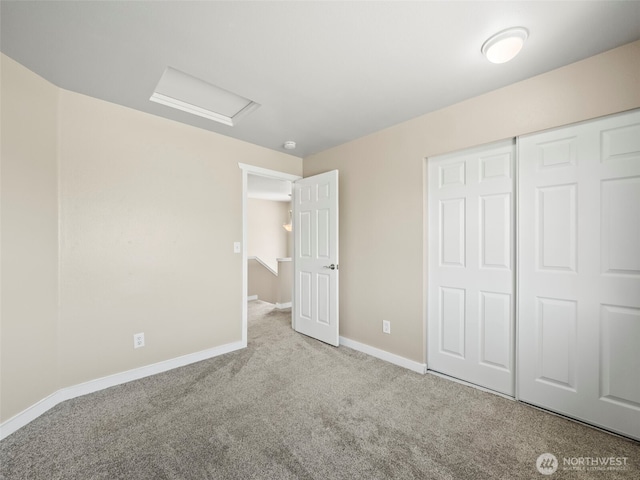 535 Blanchat Ct, Enumclaw, WA 98022 - unfurnished bedroom featuring attic access, carpet floors, and a closet