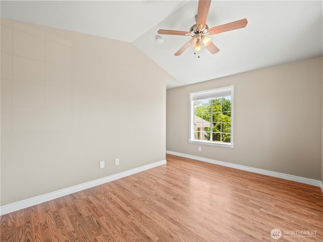535 Blanchat Ct, Enumclaw, WA 98022 - empty room featuring light wood-style flooring, lofted ceiling, ceiling fan, and a smoke detector