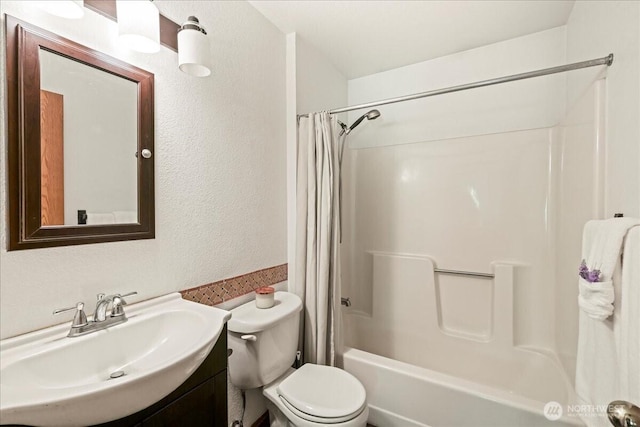 13319 15th Avenue Ct E, Tacoma, WA 98445 - full bathroom with vanity, shower / bath combination with curtain, and a textured wall