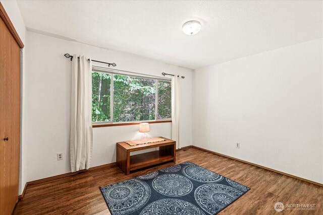 13319 15th Avenue Ct E, Tacoma, WA 98445 - sitting room with wood finished floors