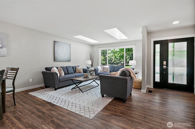 22526 251st Ave SE, Maple Valley, WA 98038 - living area with a skylight, wood finished floors, and recessed lighting