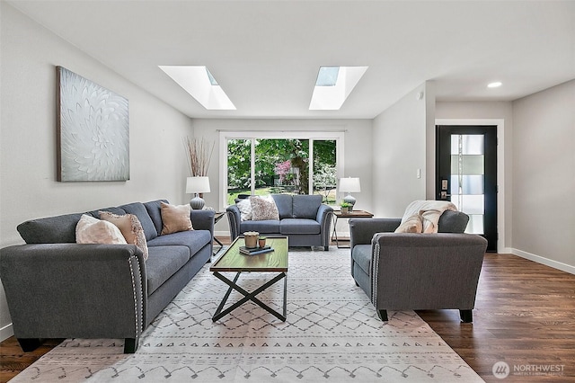 22526 251st Ave SE, Maple Valley, WA 98038 - living area featuring a skylight, wood finished floors, and recessed lighting