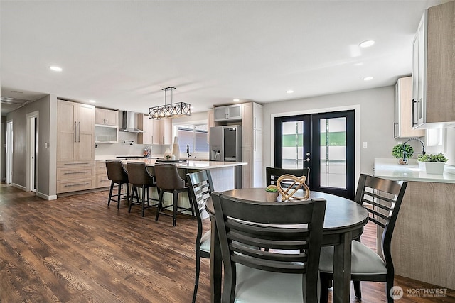 22526 251st Ave SE, Maple Valley, WA 98038 - dining area with french doors, dark wood finished floors, and recessed lighting
