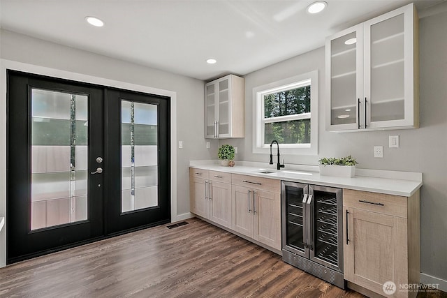 22526 251st Ave SE, Maple Valley, WA 98038 - bar area featuring beverage cooler, french doors, dark wood-style floors, and recessed lighting