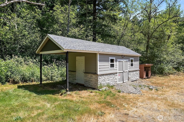 22526 251st Ave SE, Maple Valley, WA 98038 - view of outbuilding with a carport and a forest view