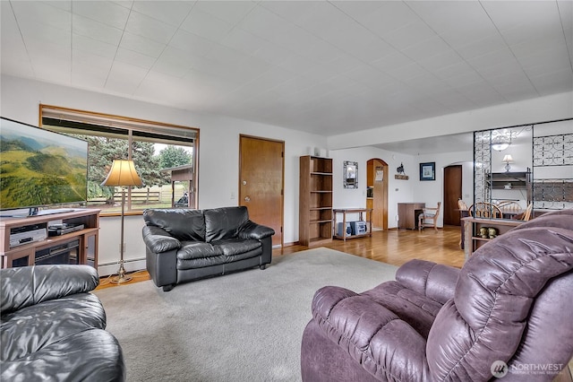 40515 228th Way SE, Enumclaw, WA 98022 - living area featuring arched walkways and baseboard heating