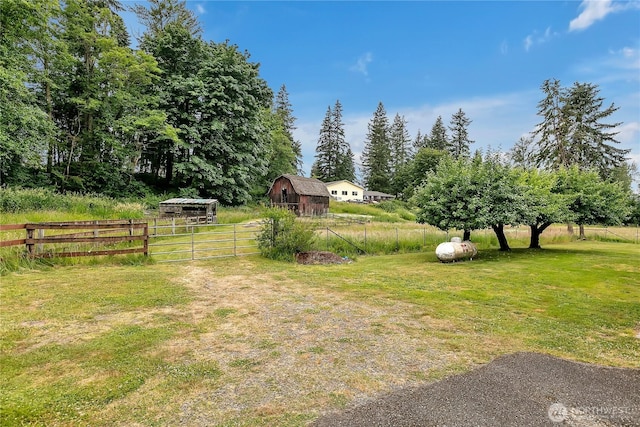 40515 228th Way SE, Enumclaw, WA 98022 - view of yard with an outbuilding, a barn, and a gate