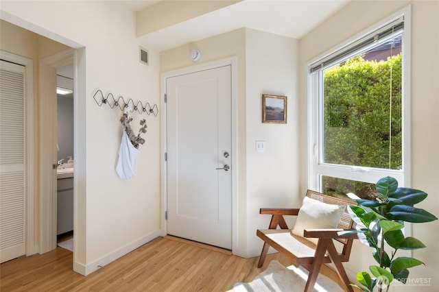 101 NW 58th St Unit 10, Seattle, WA 98107 - foyer entrance featuring light wood-style flooring