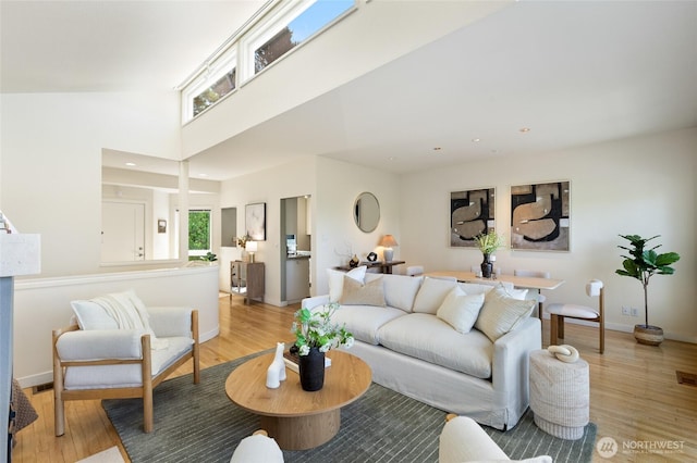 101 NW 58th St Unit 10, Seattle, WA 98107 - living room with light wood-style flooring and recessed lighting