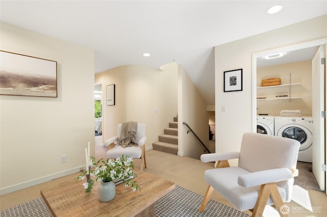101 NW 58th St Unit 10, Seattle, WA 98107 - living area featuring light colored carpet, washer and clothes dryer, stairway, and recessed lighting
