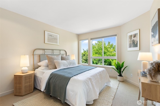 101 NW 58th St Unit 10, Seattle, WA 98107 - bedroom featuring carpet flooring and baseboards