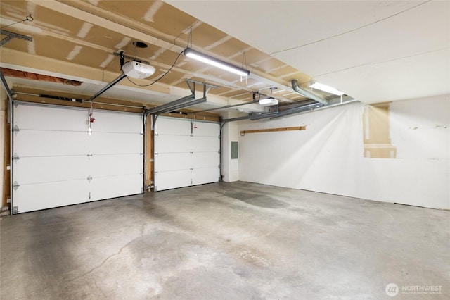 101 NW 58th St Unit 10, Seattle, WA 98107 - garage featuring a garage door opener
