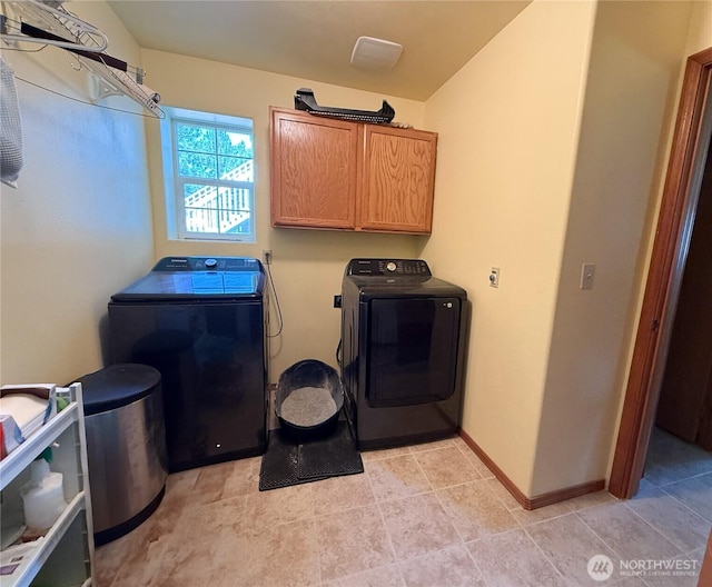 16 River Overlook St, Omak, WA 98841 - laundry area featuring cabinet space and independent washer and dryer