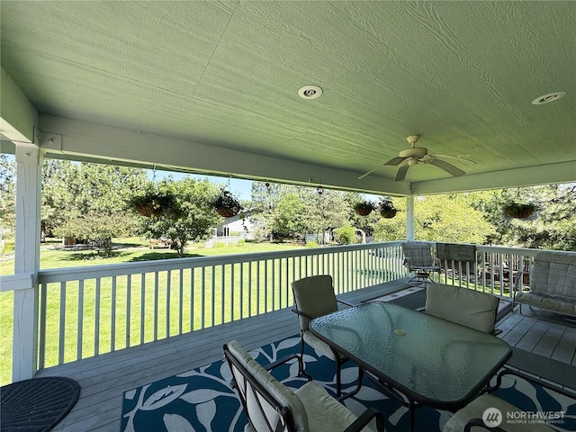 16 River Overlook St, Omak, WA 98841 - wooden terrace featuring a ceiling fan and a lawn