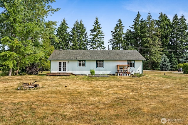 5436 180th Ave SW, Rochester, WA 98579 - back of house with french doors, a lawn, a deck, and roof with shingles
