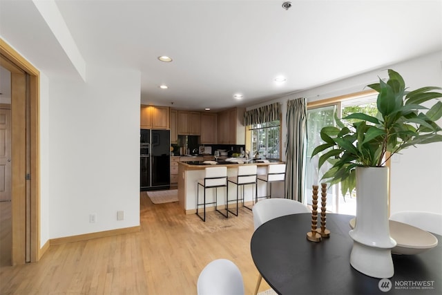 10135 NE 64th St Unit A, Kirkland, WA 98033 - dining area with recessed lighting and light wood-style flooring