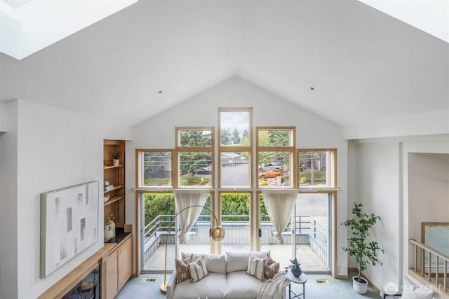 10135 NE 64th St Unit A, Kirkland, WA 98033 - living room featuring light colored carpet and high vaulted ceiling