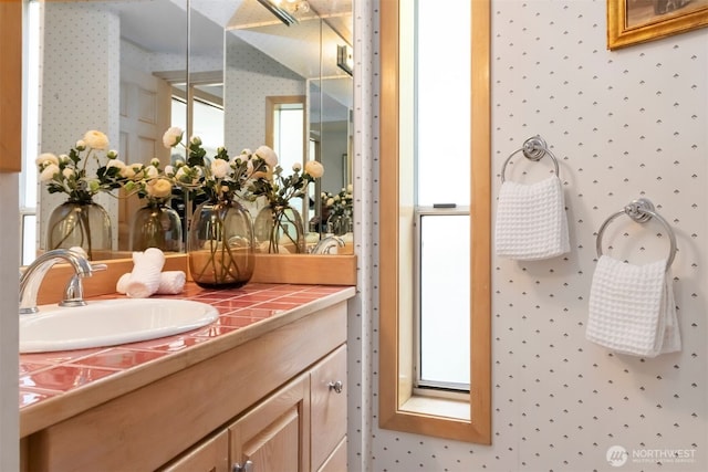 10135 NE 64th St Unit A, Kirkland, WA 98033 - bathroom featuring wallpapered walls and vanity