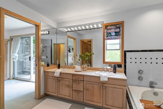 10135 NE 64th St Unit A, Kirkland, WA 98033 - bathroom featuring double vanity, healthy amount of natural light, and a garden tub