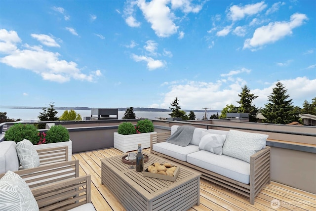 10135 NE 64th St Unit A, Kirkland, WA 98033 - deck with an outdoor living space and a water view