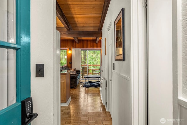 18690 Rieche Rd, Lake Wenatchee, WA 98826 - corridor featuring a wooden ceiling with exposed beams and a textured wall