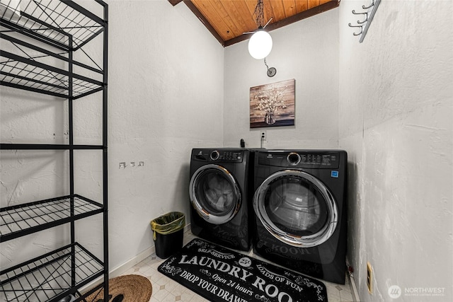 18690 Rieche Rd, Lake Wenatchee, WA 98826 - laundry room featuring separate washer and dryer, wooden ceiling, and a textured wall